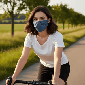 woman wearing a Face mask riding a bike 