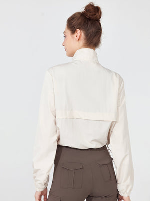 womens #Beige Windproof Track Pullover of back view