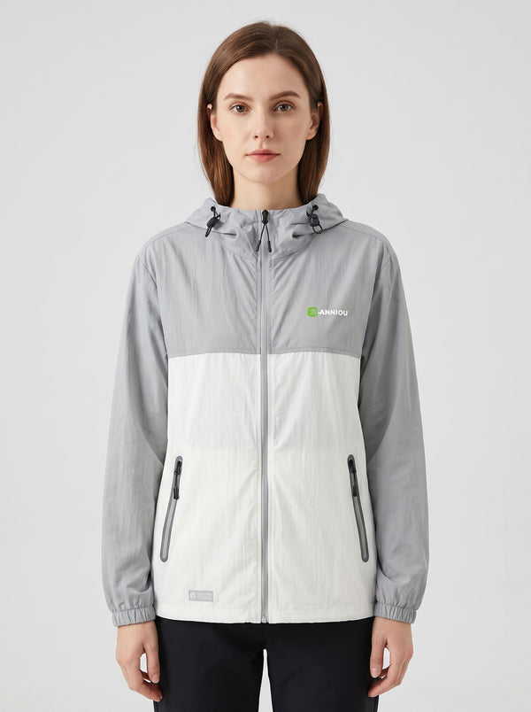 women's Lightweight Breathable UV Jacket with a hooded color-blocked design in #lightgray and white, featuring a full front zipper, zippered hand pockets, and a small green logo on the left chest.